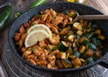 Low carb pan dish with fried chicken breast and roasted zucchini Royalty Free Stock Photo