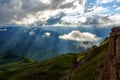 Low clouds over a highland plateau in the rays of sunset. Sunset on Bermamyt plateau North Caucasus, Karachay-Cherkessia, Russia