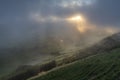 Low clouds over the Miradouro da Serra do Cume revealing the typical plots with walls landscape of Terceira Royalty Free Stock Photo