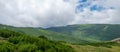 Low clouds over mountain ridge panoramic Royalty Free Stock Photo