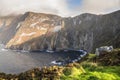 Low clouds over stunning Slieve League Cliff in County Donegal, Ireland. Irish landscape. Popular landmark for epic view and