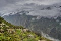 low clouds on the pass and rain in the length of the Chulyshman river Royalty Free Stock Photo