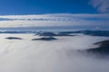 Low clouds in valley, aerial morning scene