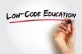 LOW-CODE EDUCATION handwritten and underlined in red, concept of modern software learning and digital teaching Royalty Free Stock Photo