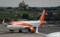 Low cost airliner Easy Jet parked at Malta International Airport