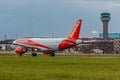 Low cost airlines Easy Jet plane landing at London Luton airport