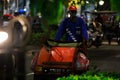 This is a low cost Indonesian transportation rickshaw and is cost and energy efficient by using power on goes like a bicycle. Royalty Free Stock Photo