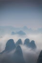 Low covering cloud over karst Mountain, Yangshuo China