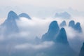 Low covering cloud over karst Mountain, Yangshuo China