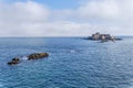 Low, dark mist moves towards Fort National near St Malo Royalty Free Stock Photo