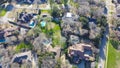 Low density housing upscale neighborhood, aerial view suburban houses with circular driveway, swimming pool, large backyard, Royalty Free Stock Photo