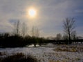 Low evenin sun over a winter landscape in Flemish ardennes Royalty Free Stock Photo