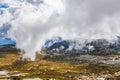 Low fluffy clouds descending over Snowy Mountains at Mount Kosciuszko National Park, Australia. Royalty Free Stock Photo