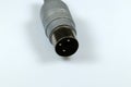 Low frequency three-pin connector for audio equipment.