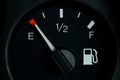 Low fuel level lamp on the dashboard. Close-up Royalty Free Stock Photo