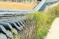 the low garden wall covered with Korean traditional roof tile Royalty Free Stock Photo