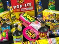 Low Grade hand held fireworks like Pop Its and Party Poppers on a black backdrop Royalty Free Stock Photo