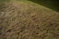 Low hill with grass on a sunny day in the park Royalty Free Stock Photo