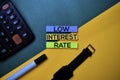 Low Interest Rate text on top view color table background Royalty Free Stock Photo
