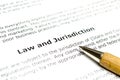 Low and Jurisdiction with wooden pen Royalty Free Stock Photo