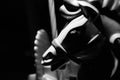 Low key black and white closeup of a horse head of a merry-go-round, with light and shadown playing on the soft curves Royalty Free Stock Photo