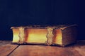 Low key image of antique story book. vintage filtered Royalty Free Stock Photo