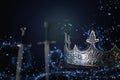 low key image of beautiful queen/king crown over antique book next to sword. fantasy medieval period. Selective focus. Glitter Royalty Free Stock Photo