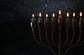 Low key Image of jewish holiday Hanukkah background Royalty Free Stock Photo