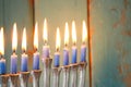 Low key image of jewish holiday Hanukkah background with menorah & x28;traditional candelabra& x29; Royalty Free Stock Photo