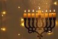 Low key image of jewish holiday Hanukkah background with menorah & x28;traditional candelabra& x29; Royalty Free Stock Photo