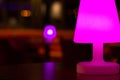 Night club pink purple lamp on table Royalty Free Stock Photo