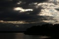 Low key shot of impressive cloudscape over Rothsee in Bavaria