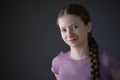 Low Key Studio Portrait Of Happy Smiling And Confident Teenage Girl Looking At Camera Royalty Free Stock Photo