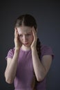 Low Key Studio Portrait Of Stressed Teenage Girl Worried About Mental Health Issues Or Bullying Royalty Free Stock Photo