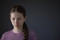 Low Key Studio Portrait Of Stressed Teenage Girl Worried About Mental Health Issues Or Bullying Royalty Free Stock Photo