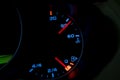 Low level fuel warning light in car dashboard. Royalty Free Stock Photo