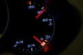 Low level fuel warning light in car dashboard. Royalty Free Stock Photo