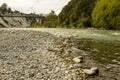 Low level shot of a fast flowing shallow river, Rangitikei River in New Zealand