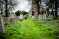 Low level view of the cemetery entrance to an old English church. Royalty Free Stock Photo