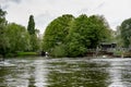 Low level view of a large canal and inland waterway seen in rural England.