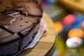 Low light photo some pieces of fresh pie in confectionery fridge on blurred background. Close-up view