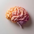 Low poly geometric brain in soft pink tones on pastel blue background, representing rigid cognition and neurodevelopmental Royalty Free Stock Photo