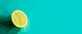 Low poly lemon on light blue background