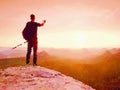 Low poly. Looking to horizon. Man on a rock looking to horizon.