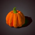 Low poly pumpkin on a gray background