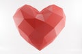 low poly red heart isolated on white. Like or papercraft concept. 3D rendering