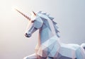 Low-poly unicorn sculpture with sharp geometric facets creating angular surfaces. Royalty Free Stock Photo