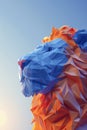 A low polygonal rendering of a lion with blue and orange colors, AI Royalty Free Stock Photo