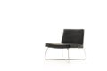 Low profile modern black chair with metal legs Royalty Free Stock Photo