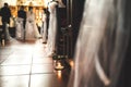 Low profile view of aisle in church lined with candles during wedding ceremony. Wedding day concept. Royalty Free Stock Photo